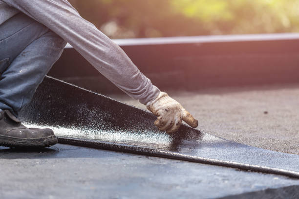 Professional Waterproofing technician working in Lowell, MI